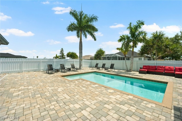 view of swimming pool with a patio and an outdoor hangout area