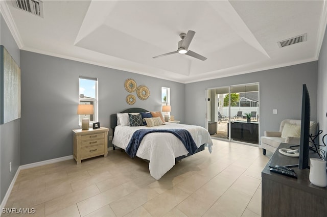 tiled bedroom featuring a tray ceiling, access to exterior, ceiling fan, and crown molding