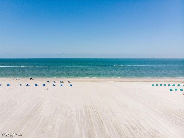 property view of water with a beach view