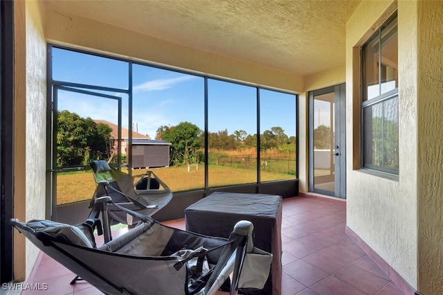 sunroom featuring a wealth of natural light