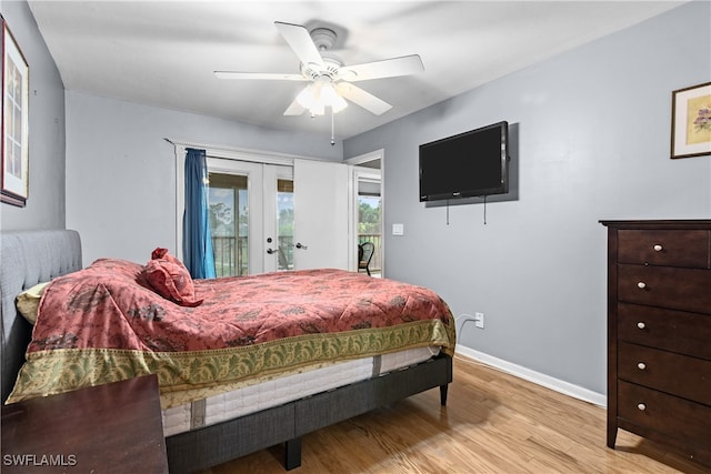 bedroom with light wood-type flooring, ceiling fan, french doors, and access to exterior