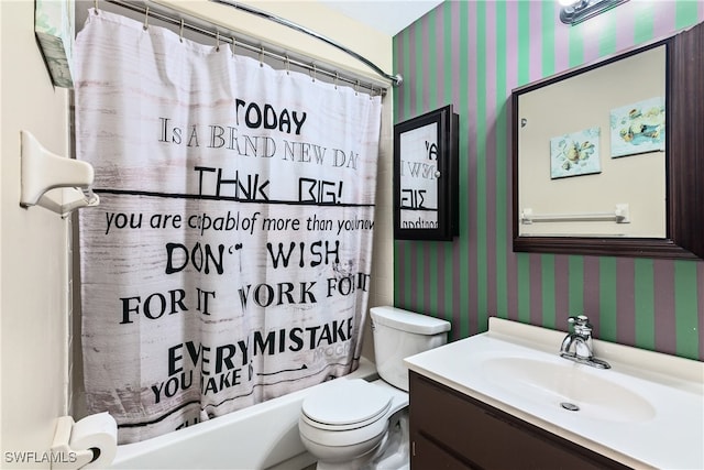 full bathroom featuring shower / bath combination with curtain, vanity, and toilet