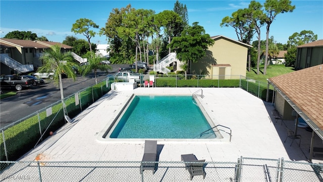 view of pool featuring a patio