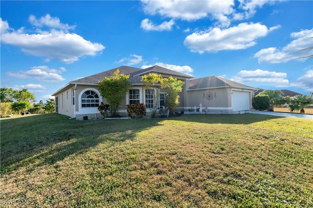 ranch-style house featuring a garage and a front yard