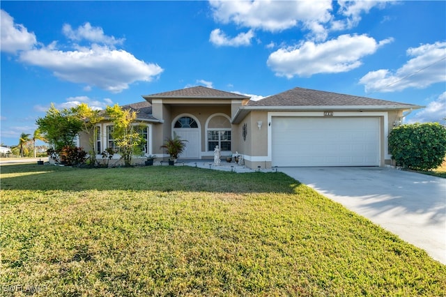 view of front facade featuring a garage and a front yard