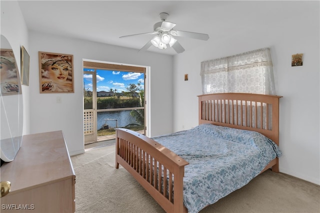 carpeted bedroom with access to outside and ceiling fan