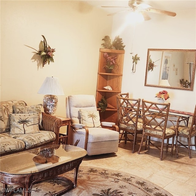 tiled living room featuring ceiling fan