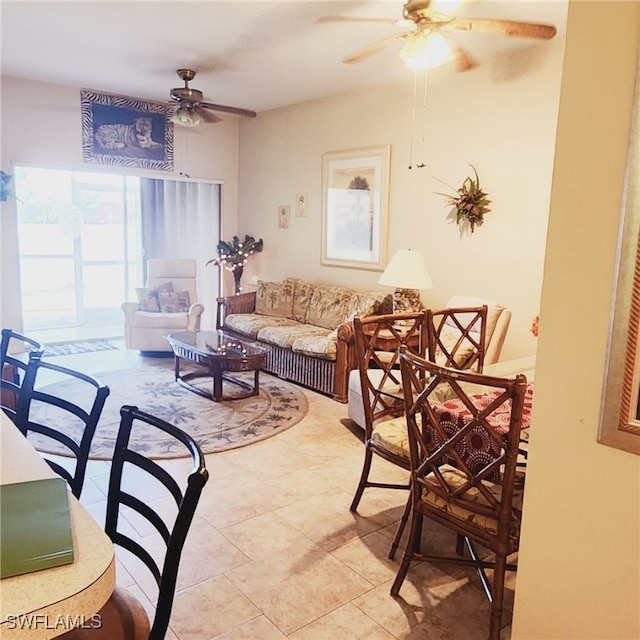 tiled living room featuring ceiling fan