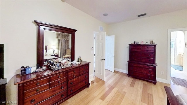 bedroom featuring light wood-type flooring