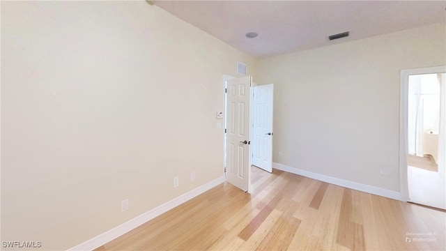 empty room featuring light wood-type flooring