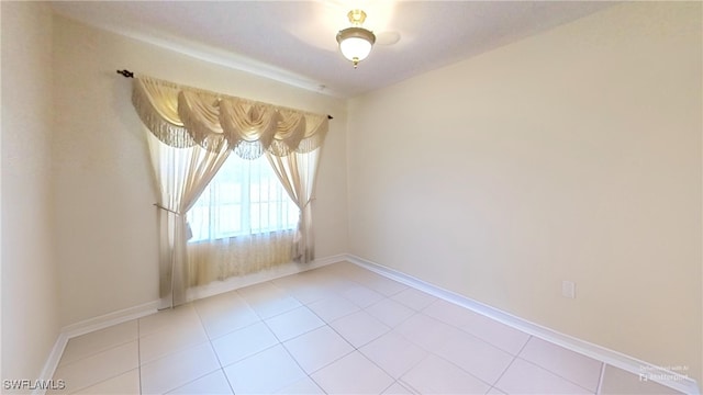 empty room with tile patterned flooring