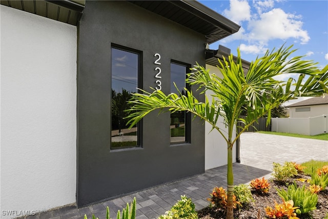 view of side of home with a patio