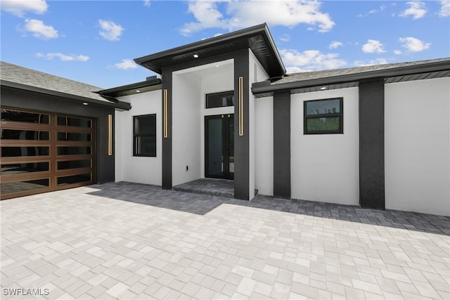 rear view of house with a patio area