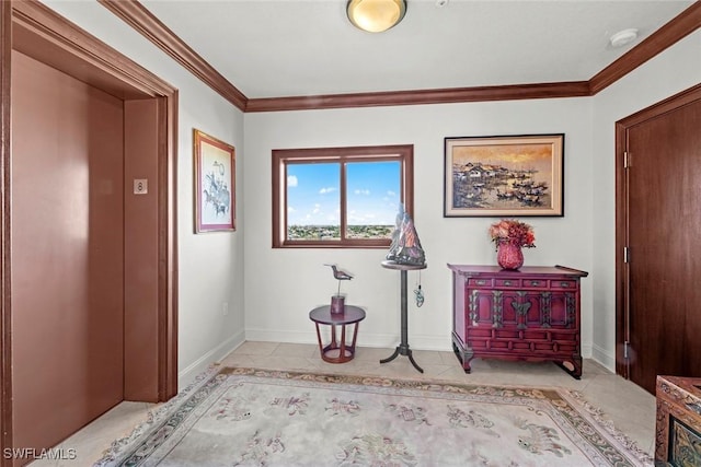 foyer entrance with light tile patterned flooring, crown molding, and baseboards