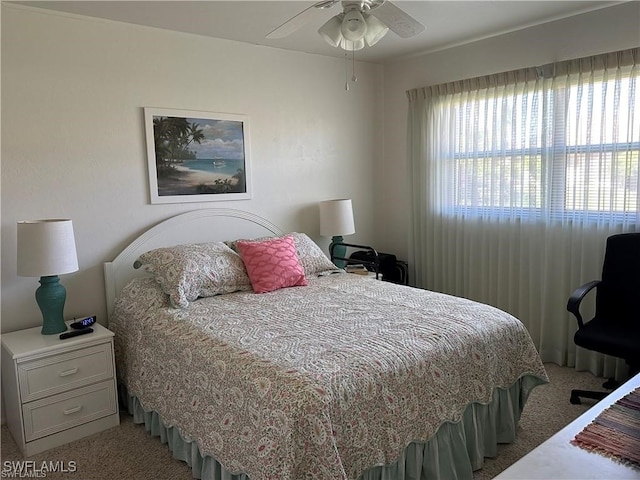 bedroom featuring carpet flooring and ceiling fan