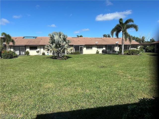 exterior space with a yard