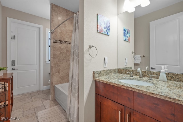 bathroom featuring vanity and shower / tub combo