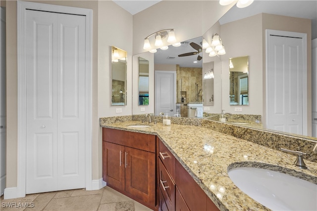 bathroom with vanity, ceiling fan, and tile patterned floors