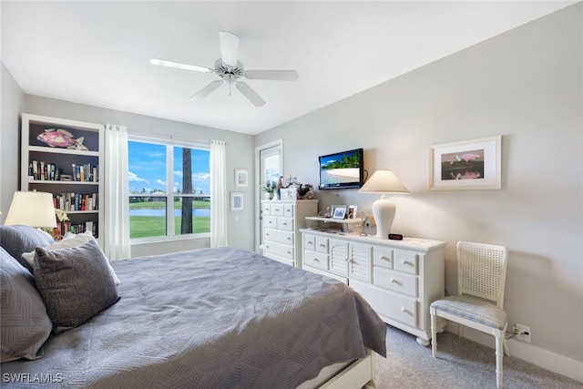 bedroom featuring ceiling fan and carpet floors