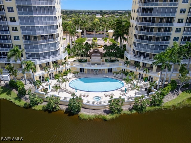 view of pool featuring a water view