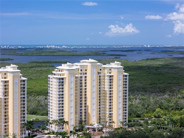 birds eye view of property featuring a water view