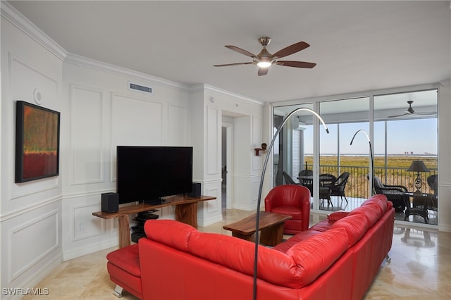 living room featuring crown molding