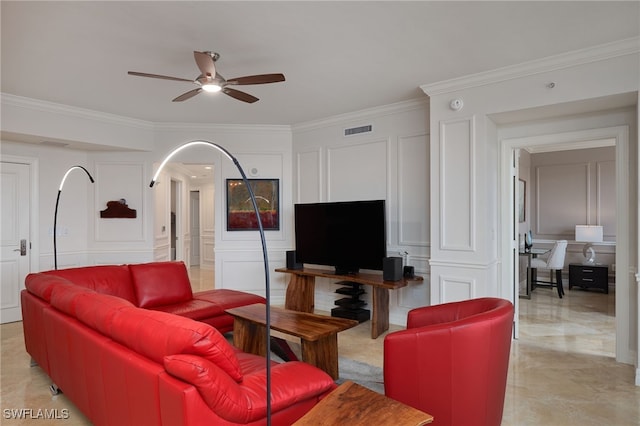 living room featuring ceiling fan and crown molding