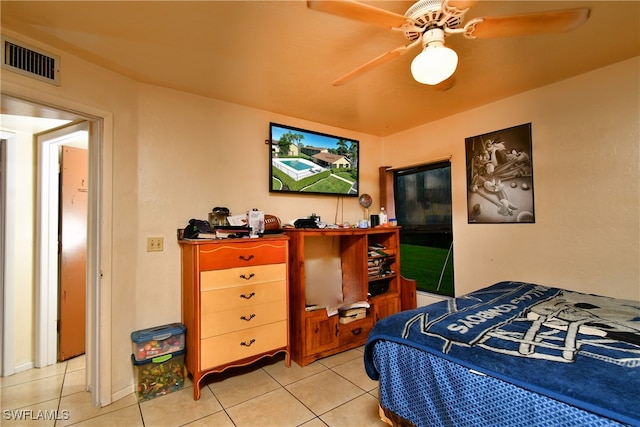 bedroom with light tile patterned floors and ceiling fan