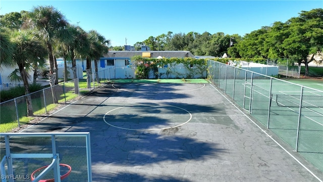 surrounding community featuring basketball hoop