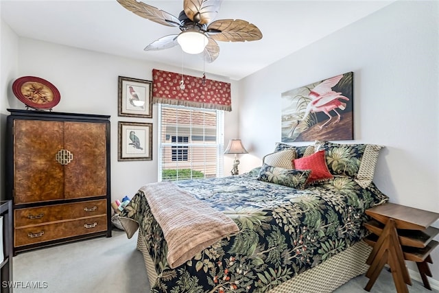 bedroom with ceiling fan and carpet floors