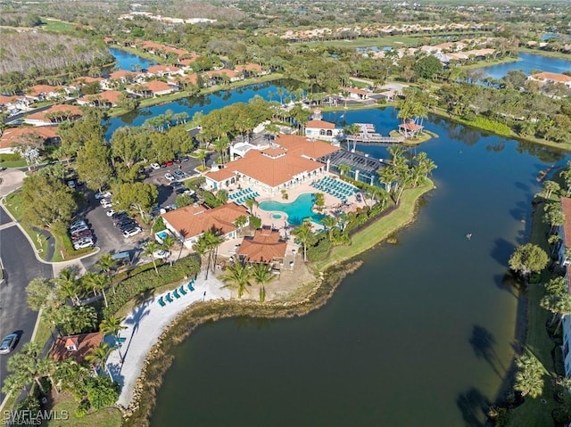 drone / aerial view with a water view