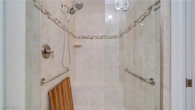 bathroom featuring tiled shower