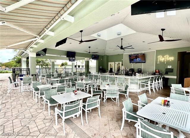 dining area with vaulted ceiling