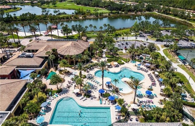 birds eye view of property featuring a water view