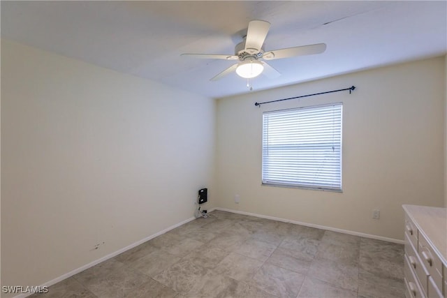 empty room featuring ceiling fan