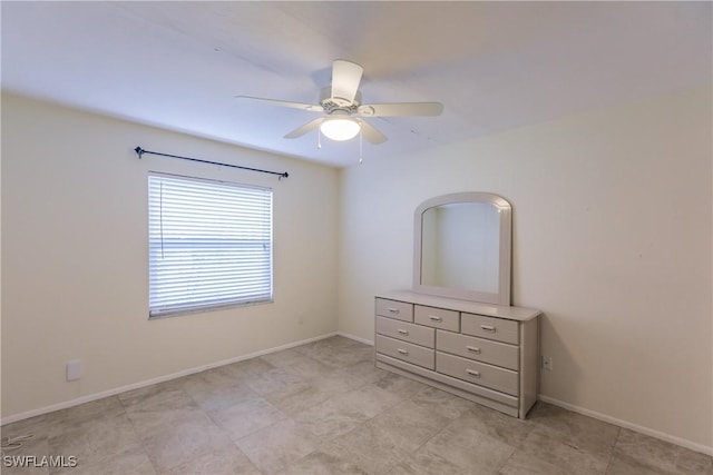 unfurnished bedroom with ceiling fan