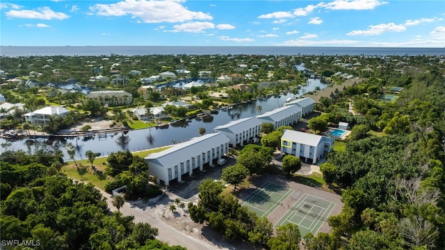 bird's eye view with a water view