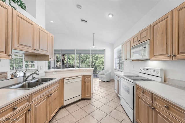 kitchen featuring sink, hanging light fixtures, lofted ceiling, white appliances, and light tile patterned flooring