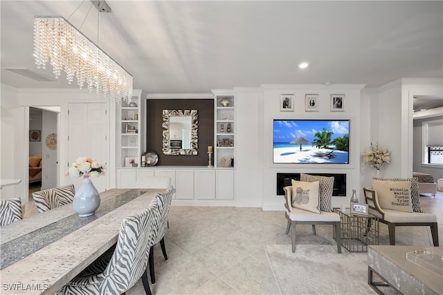 tiled bedroom featuring a fireplace, crown molding, and a chandelier