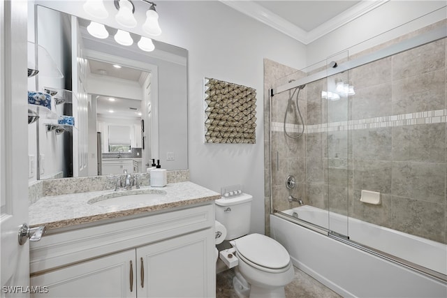 full bathroom featuring vanity, toilet, ornamental molding, and enclosed tub / shower combo