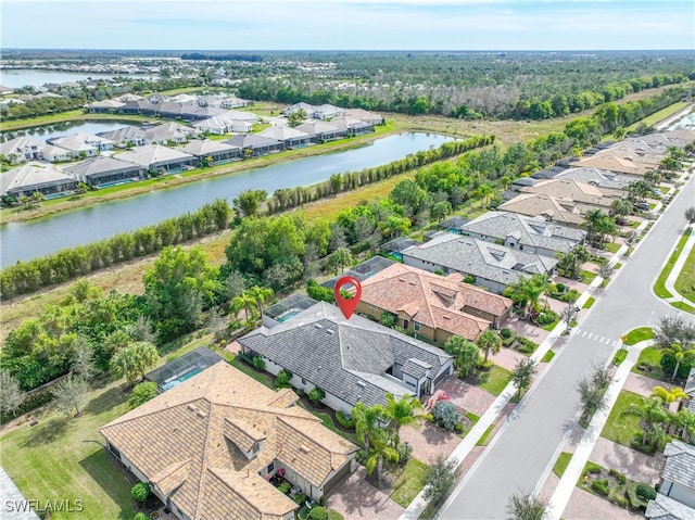 drone / aerial view featuring a water view