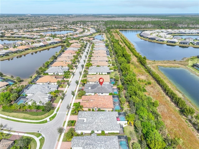 drone / aerial view featuring a water view