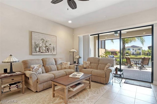 tiled living room with ceiling fan