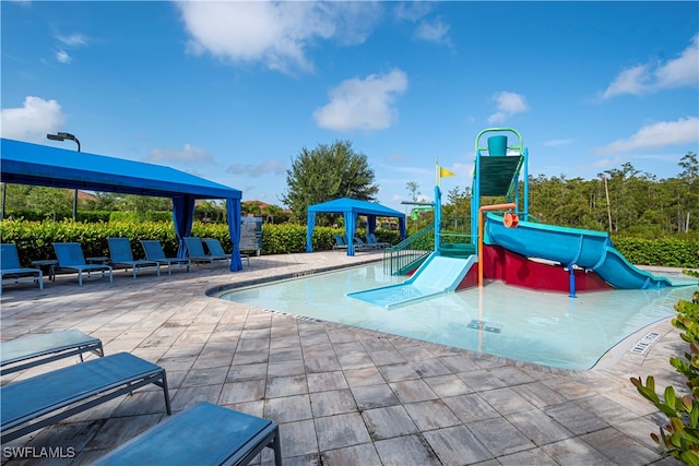 view of swimming pool with a gazebo and a patio area