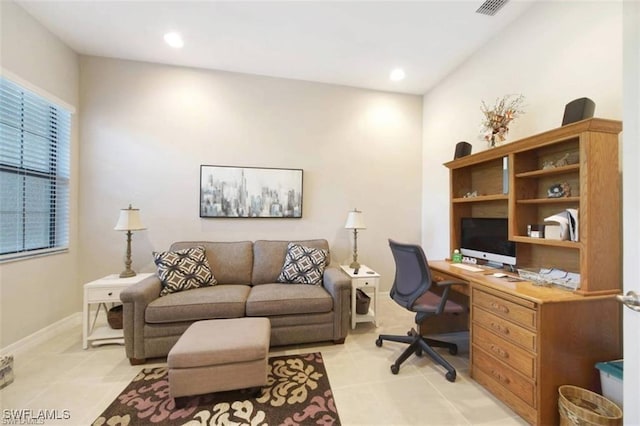 home office featuring light tile patterned floors