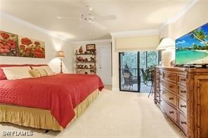 bedroom featuring a ceiling fan and crown molding