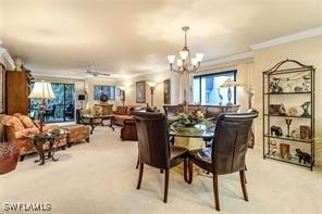 carpeted dining room with a chandelier and ornamental molding