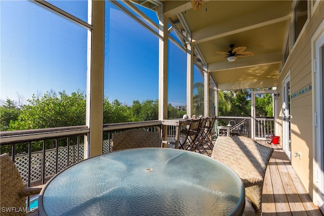 wooden terrace featuring ceiling fan