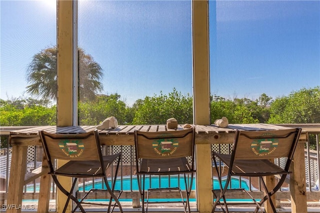 331 Spanish Gold Ln, Upper Captiva, FL 33924 - view of patio / terrace with view of wooded area