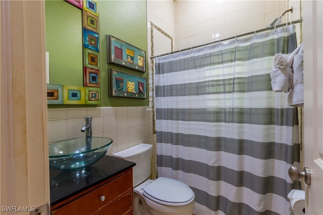 bathroom featuring toilet, vanity, backsplash, tile walls, and a shower with curtain